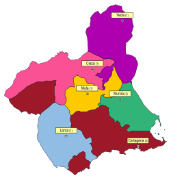 Electoral map of the province of Murcia during the Bourbon Restoration. The particular configuration of the Cartagena constituency, divided into three geographically isolated territories, has been identified by Ruiz Abellán (1991) as a case of gerrymandering aimed at neutralizing the vote of Cartagena and the mining areas by adding rural votes, which were more susceptible to control by the political establishment.[173]