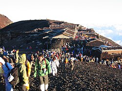 Hikers climbing Mount Fuji