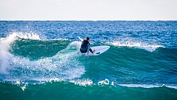 Surfing in winter at Bondi Beach NSW