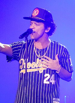 American singer Bruno Mars, whose song "When I Was Your Man" was allegedly paraphrased into lyrics of "Flowers".