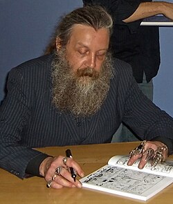 Moore signing an autograph, 2006