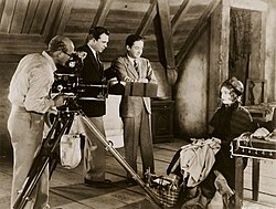 Hendrik Sartov (cinematographer), King Vidor (director), Irving Thalberg (producer) & Lillian Gish (co-star) on the set of La Bohème