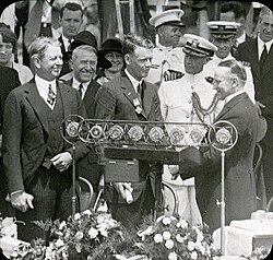 President Calvin Coolidge awards Lindbergh the Distinguished Flying Cross, June 11, 1927
