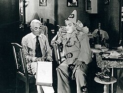 Edward José (left), the director of the film My Cousin, with Caruso during a break in filming