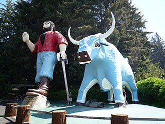 Paul Bunyan (49 foot) and Babe the Blue Ox (35 foot) statues at Trees of Mystery near Klamath, California. Note the size of the visitors at Babe's hooves.