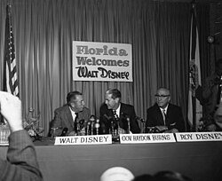Disney (left) with his brother Roy O. Disney (right) and then Governor of Florida W. Haydon Burns (center) on November 15, 1965, publicly announcing the creation of Disney World
