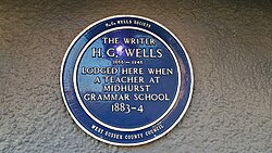 Commemorative plaque in Midhurst, West Sussex, marking where Wells lodged while a teacher at Midhurst Grammar School between 1883 and 1884