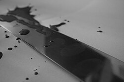 Barely visible latent prints on a knife