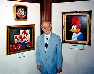 Lantz in 1990 with paintings of Woody Woodpecker