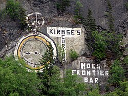 Gold Rush-era advertisements made on one of the mountains forming the eastern wall of the valley