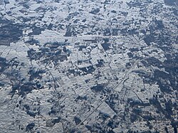 Various depressions and sinkholes visible from the air in Meade County, Kentucky