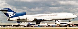 A former United States Postal Service Boeing 727-200 aircraft at Miami International Airport in 1999
