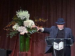 Mosley at the 2024 National Book Awards, introducing Paul Coates