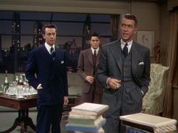 Stewart with Farley Granger and John Dall in Rope (1948), his first collaboration with Alfred Hitchcock. He was criticized for being miscast in the role of a cynical professor.