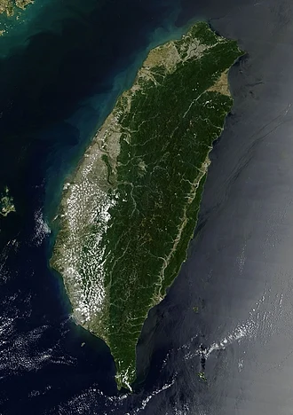 A satellite image of Taiwan, showing it is mostly mountainous in the east, with gently sloping plains in the west. The Penghu Islands are west of the main island.