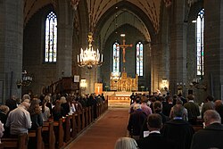 Evangelical-Lutherans of the Church of Sweden praying vespers (one of the canonical hours) in Vadstena Abbey Church (Östergötland County, Sweden)