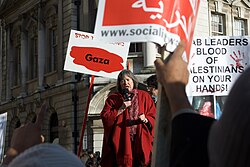 Short speaking at a rally in Birmingham in January 2009, urging the crowd "not forget the crimes being committed against the people of Gaza" following the 2008–2009 Israel–Gaza conflict