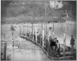Hurdles being used to cross the Mississippi River.