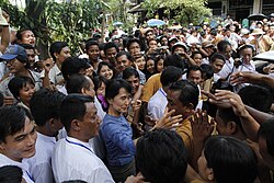 Aung San Suu Kyi, Burmese pro-democracy leader, greeting supporters from Bago State, Burma, 14 August 2011. She has stated that she was attracted to nonviolent civil resistance, not on moral grounds, but "on practical political grounds". Photo: Htoo Tay Zar