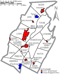 Map of Blair County, Pennsylvania, with municipal labels showing cities and boroughs (red), townships (white), and census-designated places (blue)