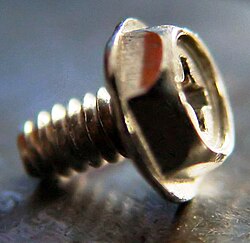 Combination flanged-hex/Phillips-head screw used in computers