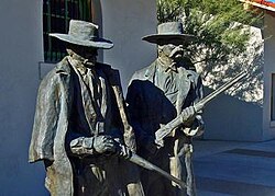 Life-sized statues of lawmen Wyatt Earp and deputy Doc Holliday at the Historic Railroad Depot