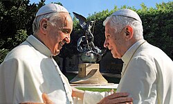 Pope emeritus Benedict XVI with Pope Francis (left) in the Vatican Gardens, July 2013