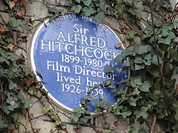 An English Heritage blue plaque marks where Hitchcock lived at 153 Cromwell Road, Kensington, London.