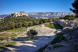 Pnyx foreground, speaker's platform right, Acropolis background.
