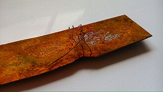 Electrochemically oxidized iron (rust)