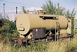 A tank car made from bent and welded steel plates.