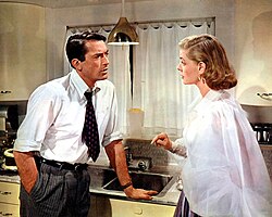 Bacall and Gregory Peck in the film Designing Woman (1957)