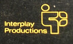 The logo used for Interplay Productions on the cover of Wasteland; Brian Fargo stated that the logo was intended to resemble a person seated in front of a keyboard.[1]