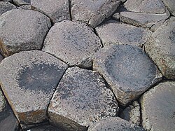 Large masses must cool slowly to form a polygonal joint pattern, as here at the Giant's Causeway in Northern Ireland