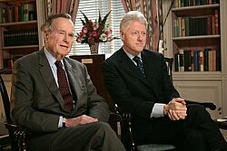 Former presidents George H. W. Bush and Clinton in the White House Library, January 2005