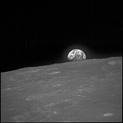 The first photograph of Earth from the Moon by a person, also by Anders, taken shortly before Earthrise (for a colorized version see this image)