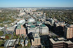 The local government of Arlington County, Virginia encourages transit-oriented development within 1⁄4 to 1⁄2 mile (400 to 800 m) from the county's Washington Metro rapid transit stations, with mixed-use development, bikesharing and walkability.