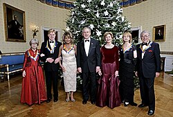 2005 Kennedy Center Honorees: Julie Harris, Robert Redford, Tina Turner, Suzanne Farrell and Tony Bennett with President George W. Bush and First Lady Laura Bush, in the Blue Room at the White House, December 4, 2005.